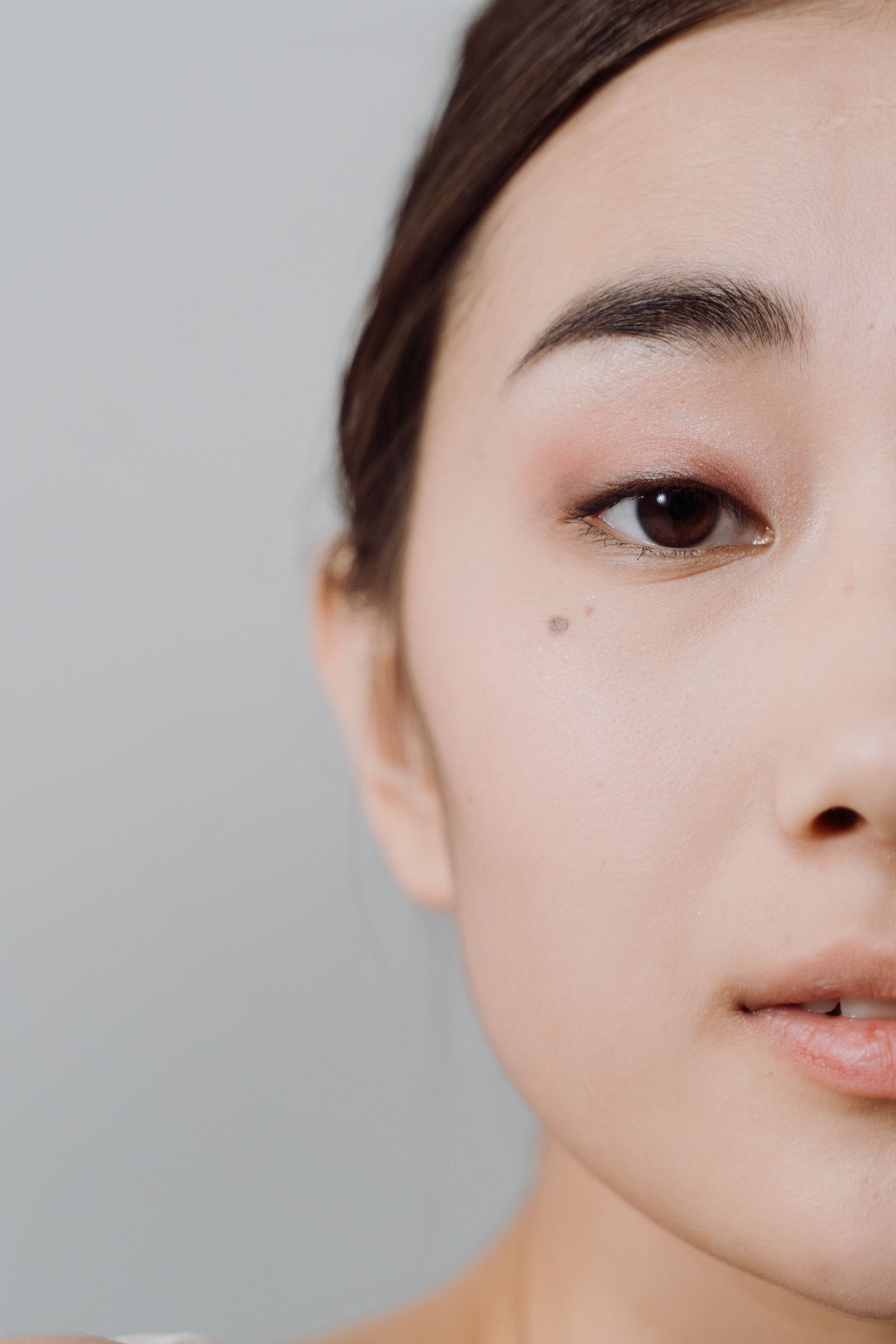 A DermaMedics patient with healthy, glowing skin